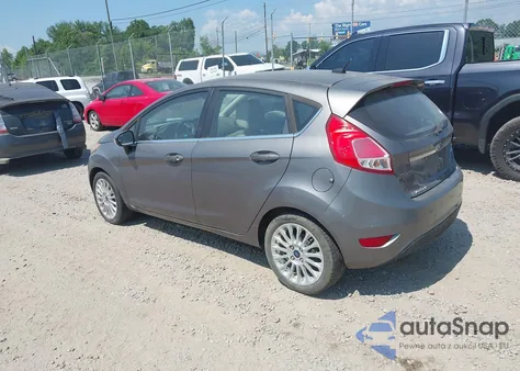 2014 Ford Fiesta Titanium из США, поврежденный, VIN 3FADP4FJ7EM106069